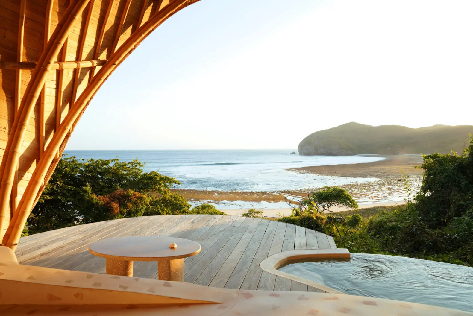 Private infinity pool with panoramic ocean view from Eco Bamboo Beach View Lodge — Kini Resort Sumbawa
