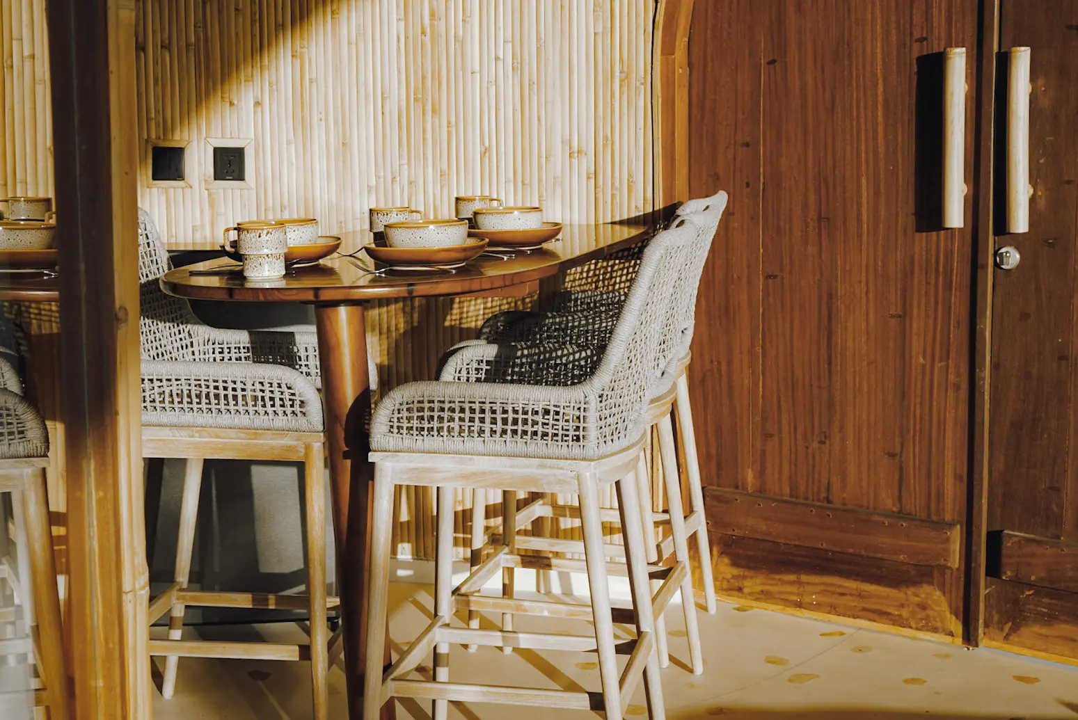 Interior of Eco Bamboo Beach View lodge with bamboo ceiling and natural light — Kini Resort Sumbawa